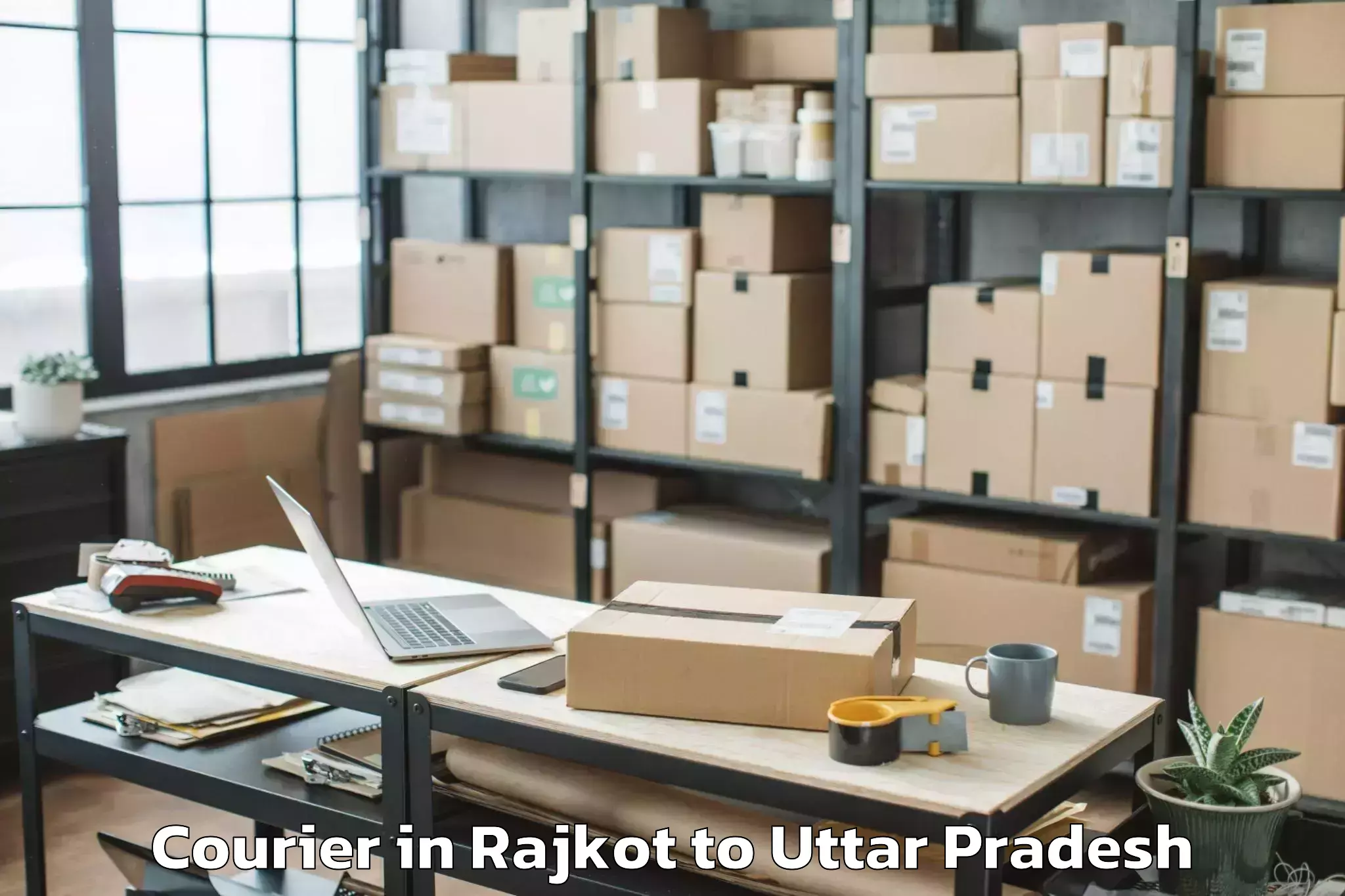 Book Rajkot to Karwi Courier Online